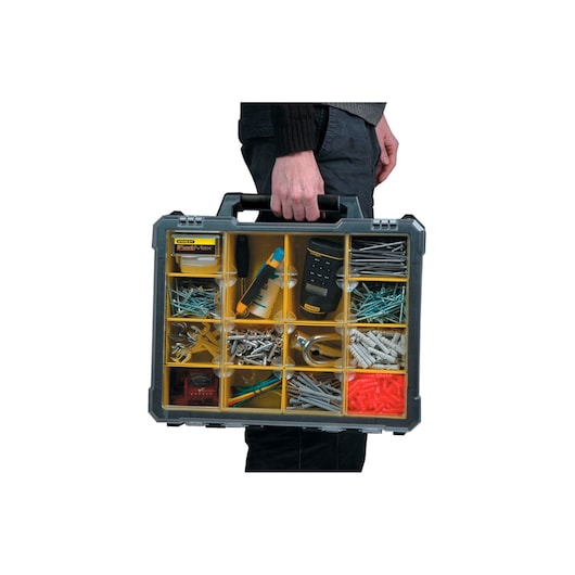 STANLEY 014461M organizer case with yellow compartments, shown being carried by hand, filled with tools and hardware.