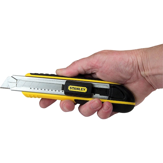 Stanley 10-481 utility knife with segmented blade, held in hand, yellow and black handle.