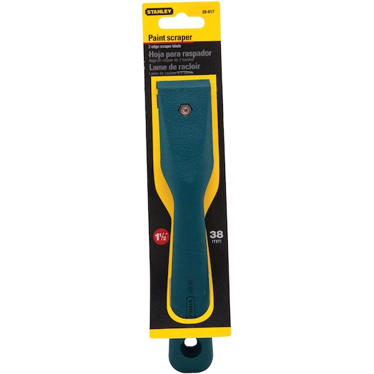Stanley 28-617 paint scraper with green textured handle in retail packaging, front angle, 38 mm blade.