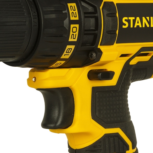 Photo of STANLEY SCD20C2K yellow and black cordless drill close-up, showing grip and torque settings.